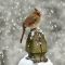 female cardinal during a snow storm